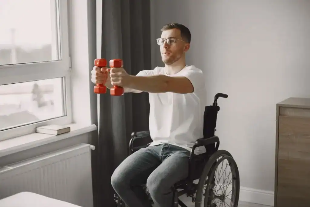 Empowering Weight Loss: A Comprehensive Guide for Individuals with Disabilities 1 Image of man doing exercise in his wheelchair to aid weight loss Stanford-le-Hope