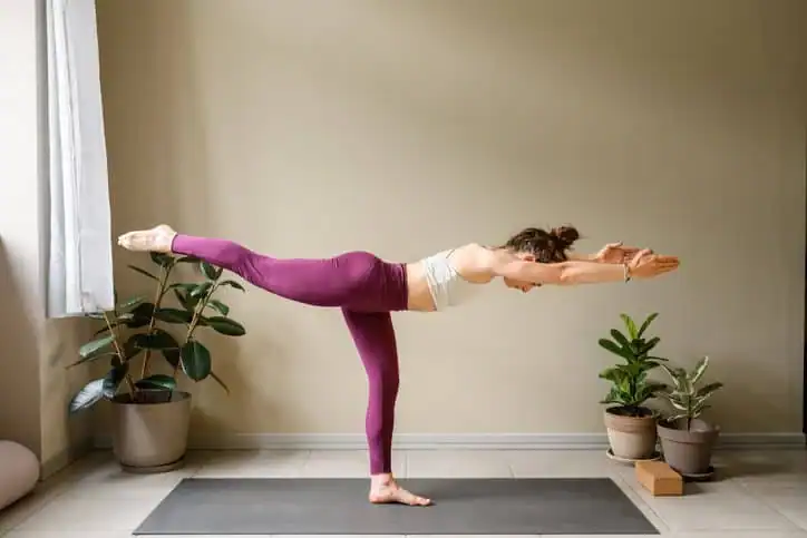 Woman doing Yoga exercise Stanford-le-Hope to help with toning the body. 