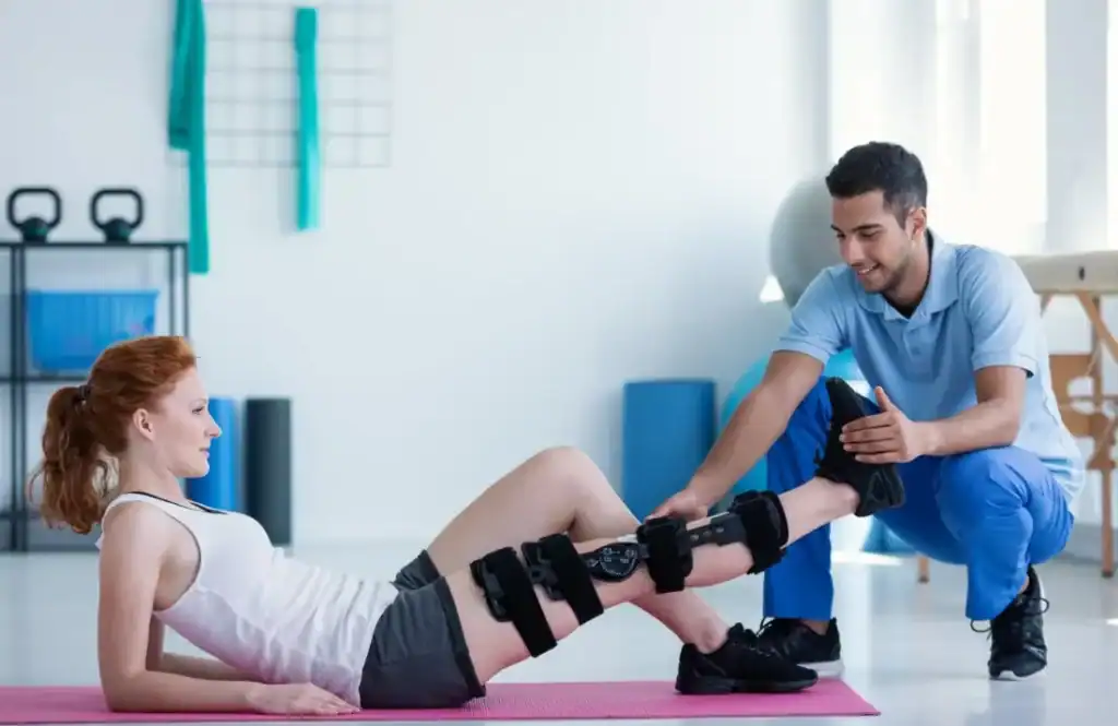 Woman having treatment to help muscle recovery Stanford-le-Hope after an injury